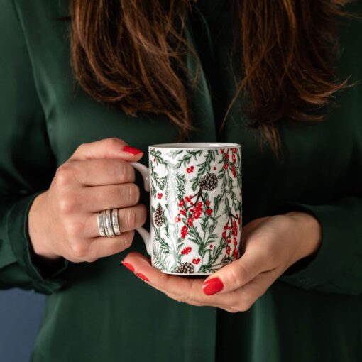 Christmas garden bone china mug by Cherith Harrison