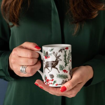 Christmas reindeer bone china mug by Cherith Harrison