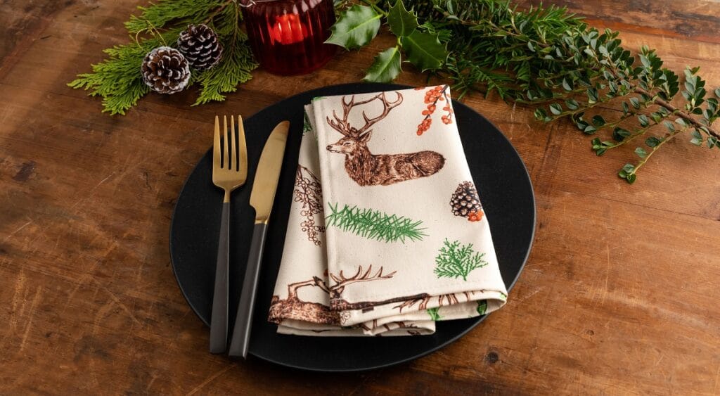 Cherith Harrison Christmas Reindeer Single Napkin on a Plate