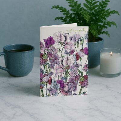 Sympathy Sweet Peas Greetings Card by Cherith Harrison on Marble Surface