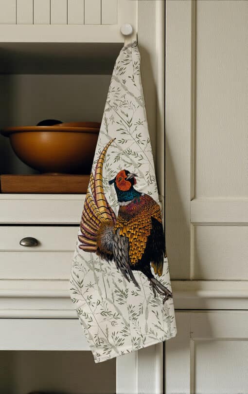 Pheasant Tea Towel Hanging on Cupboard